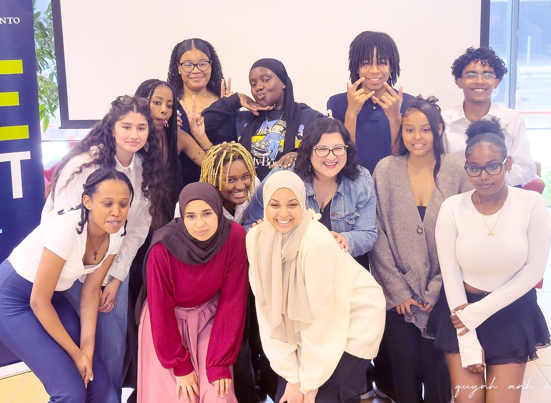 SEE U of T students and staff posing together in Waters Lounge