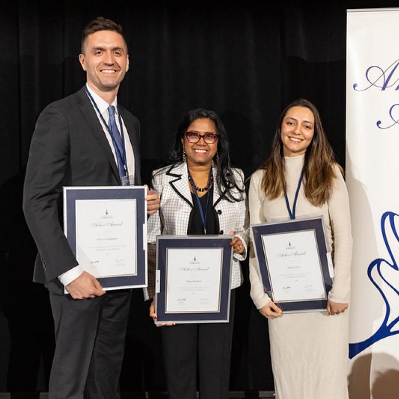 Jesse Grimstead, Maina Rambali and Akshika Dave with their Arbor Award. 