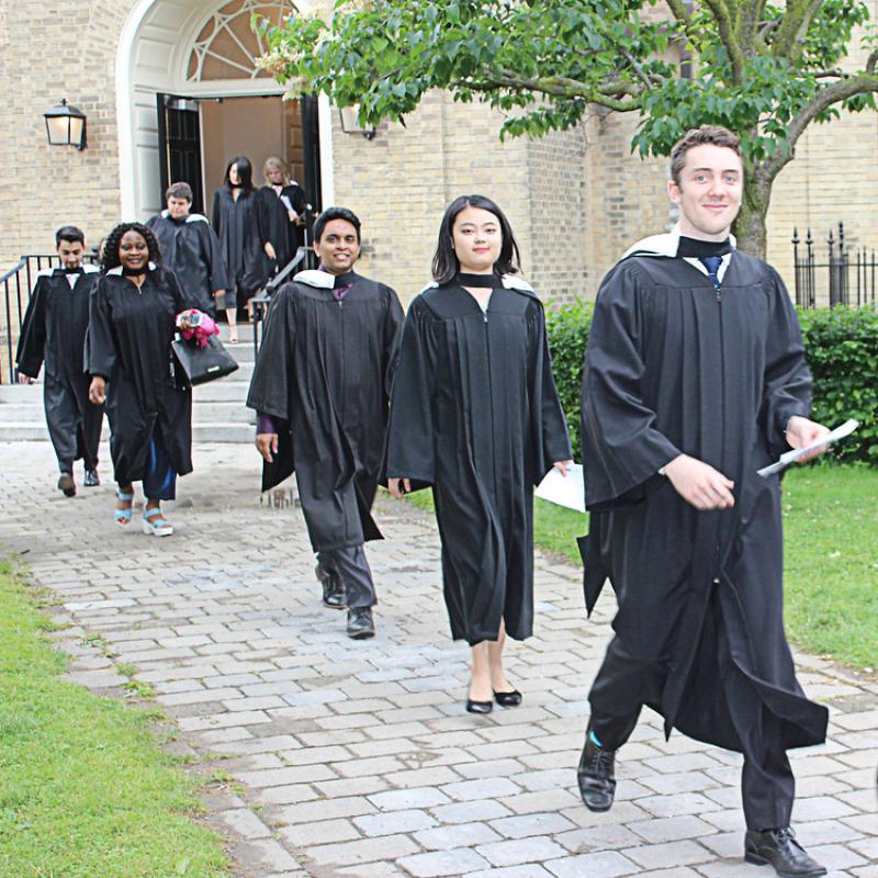 Convocating students on their way to Convocation Hall