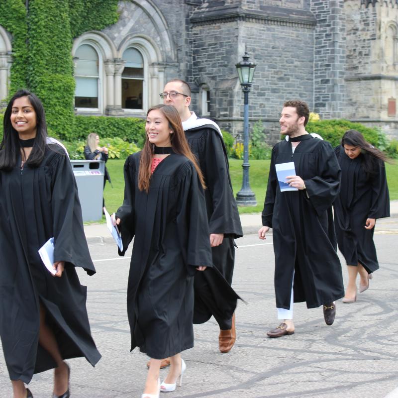 Woodsworth graduands walking towards Convocation Hall