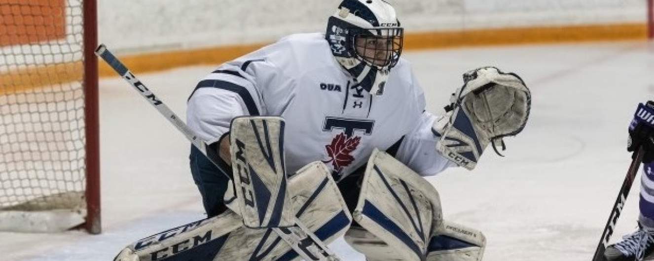 Alex Bishop goaltends for the Varsity Blues hockey team