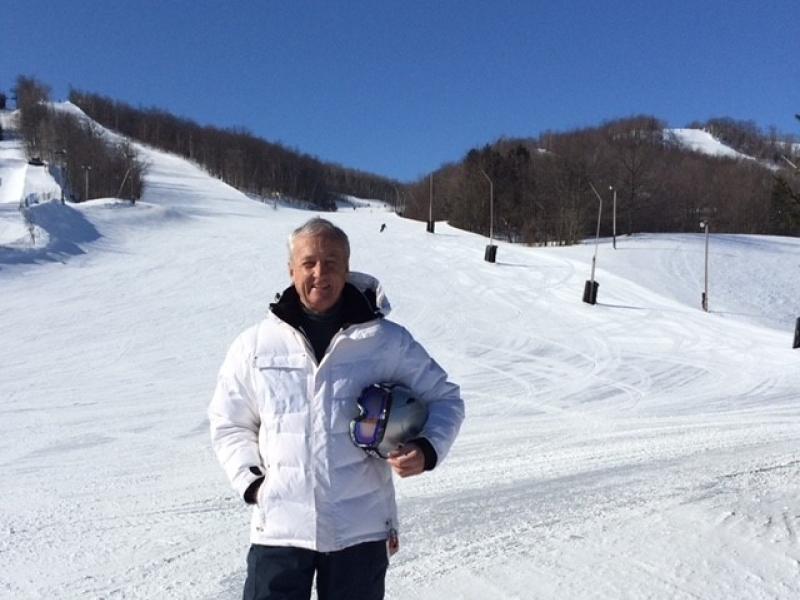 Image of Dennis Donohoe at a ski hill