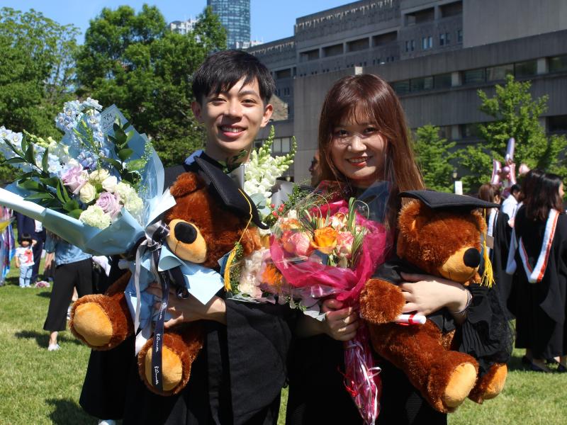 Students posing for photos after the convocation ceremony.