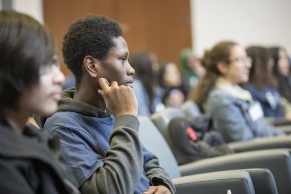 SEE U of T students listening to a lecture in a classroom.
